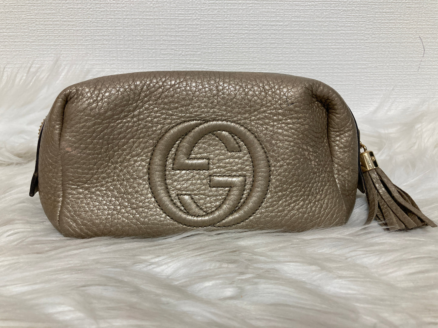 Gucci Champagne Pouches A-14334